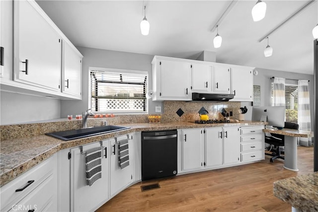 kitchen featuring white cabinetry, sink, pendant lighting, and black appliances