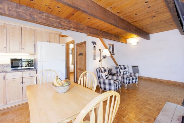 dining space with beamed ceiling, wooden ceiling, and light parquet flooring