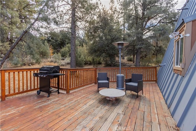 wooden terrace with grilling area