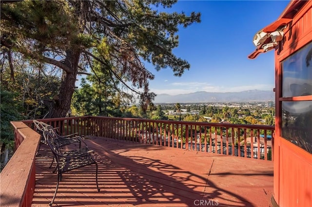 deck with a mountain view