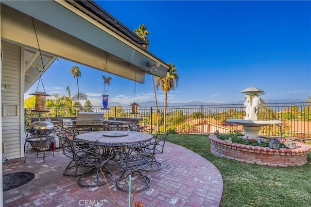 view of patio / terrace with a grill