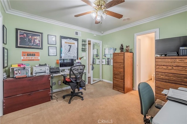 carpeted office space with crown molding and ceiling fan