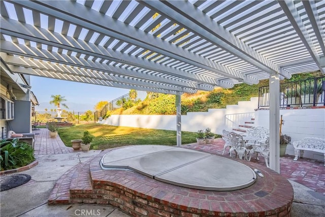 view of patio / terrace featuring a pergola