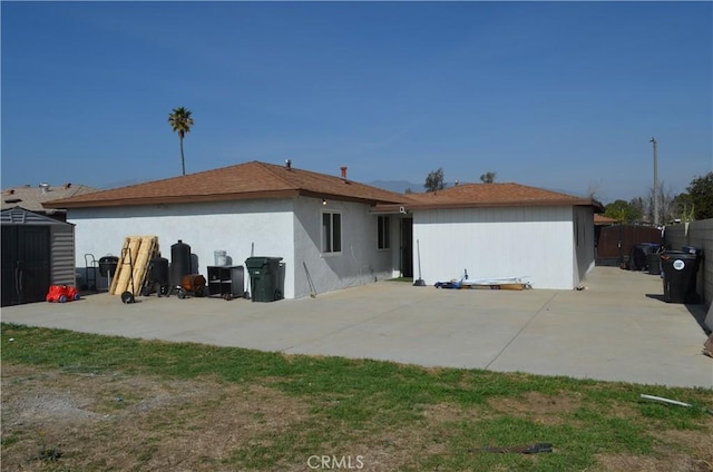 rear view of property with a patio area