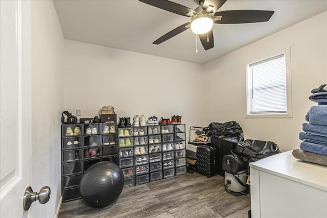 office with hardwood / wood-style flooring and ceiling fan