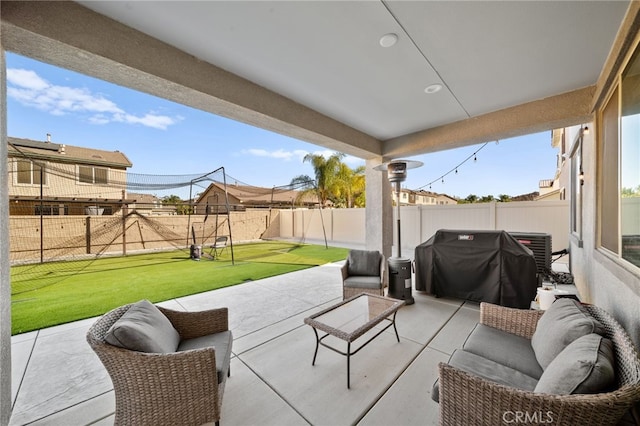 view of patio / terrace with grilling area and an outdoor living space