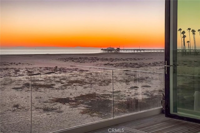 property view of water featuring a beach view