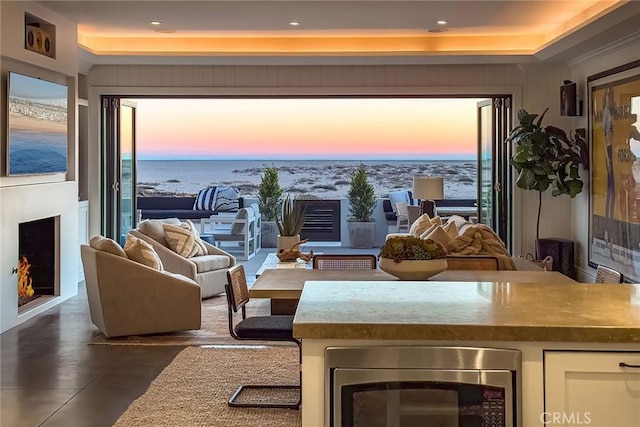 living room featuring a water view