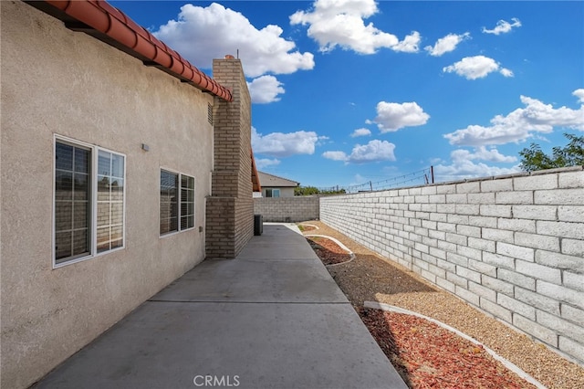 view of home's exterior featuring a patio