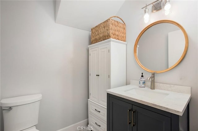 4698 Heil Ave Unit 23C, Huntington Beach, CA 92649 - half bathroom featuring toilet and vanity