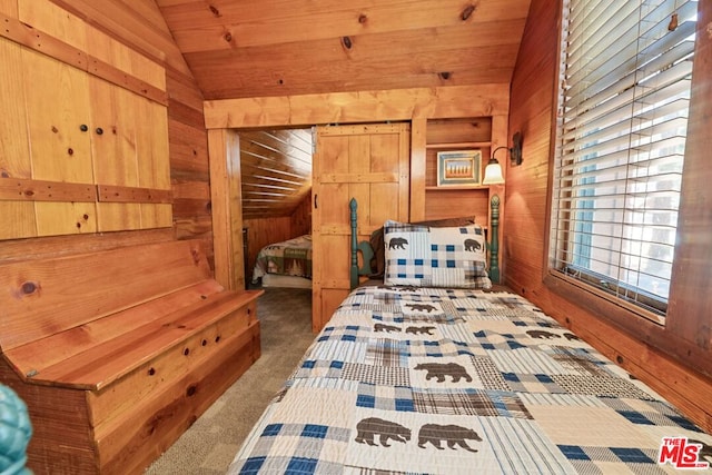 bedroom featuring wood walls, wooden ceiling, lofted ceiling, and dark colored carpet