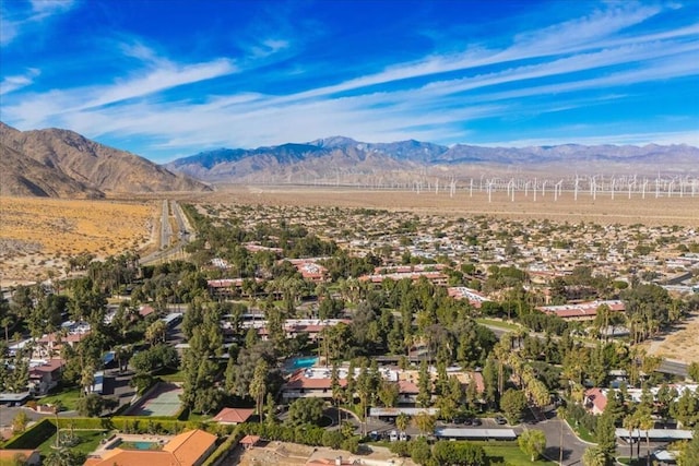 birds eye view of property featuring a mountain view