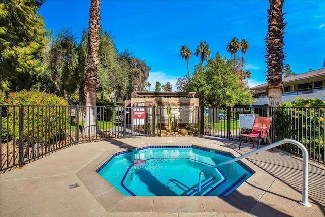 view of pool with a community hot tub