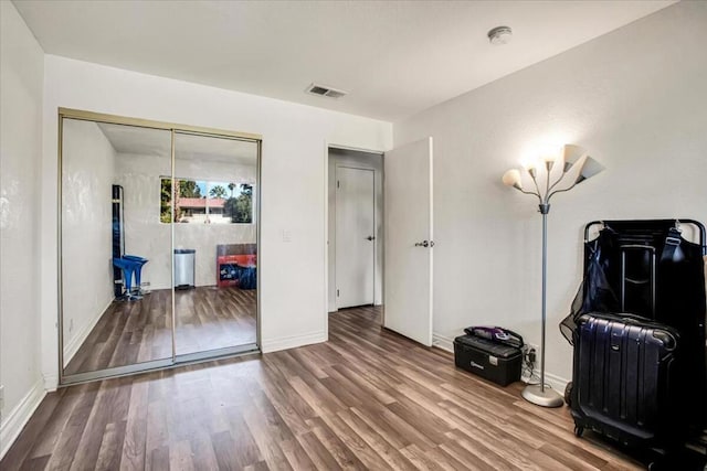 miscellaneous room featuring hardwood / wood-style floors