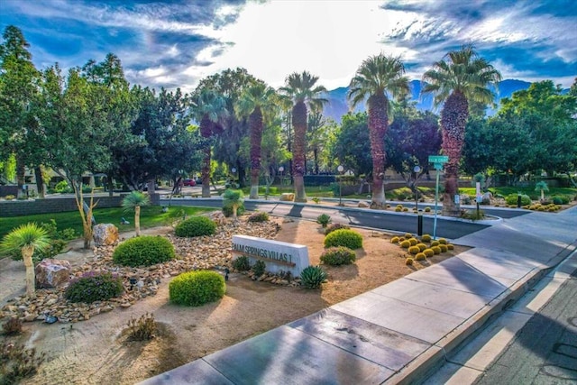 surrounding community featuring a mountain view