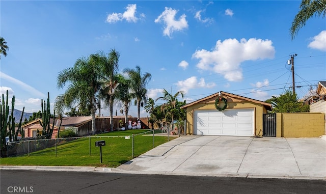 view of front of house featuring a garage and a front yard