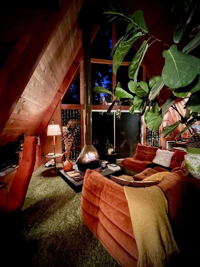 bedroom featuring wood ceiling and lofted ceiling