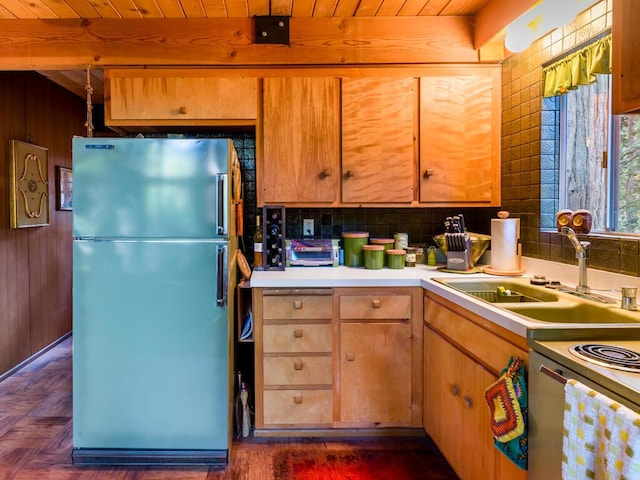 kitchen featuring sink, wood ceiling, beam ceiling, fridge, and dark parquet floors