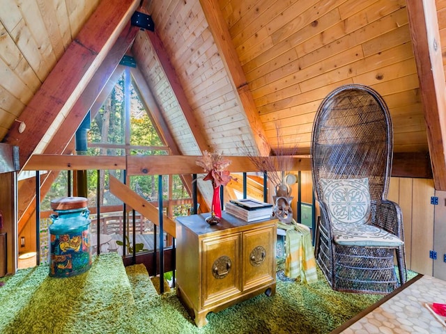 interior space with lofted ceiling with beams, wooden ceiling, and wooden walls