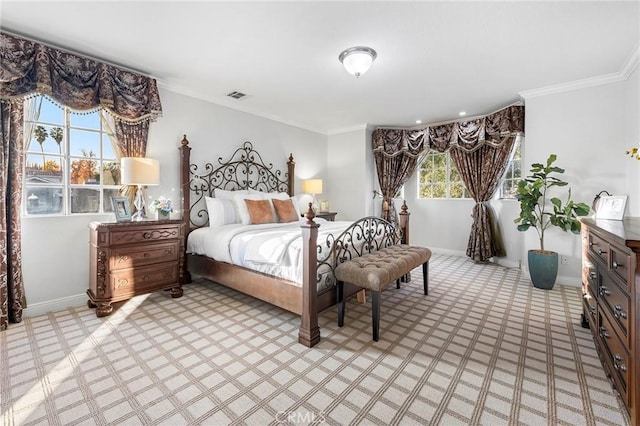 bedroom featuring multiple windows and ornamental molding