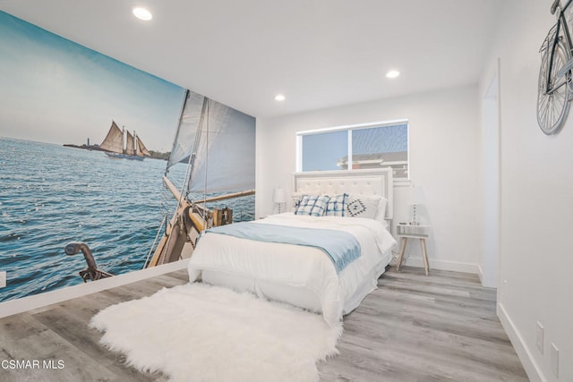 bedroom with light wood-type flooring