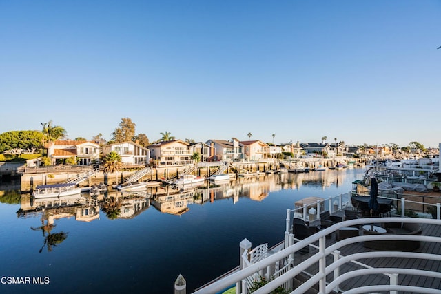 dock area featuring a water view