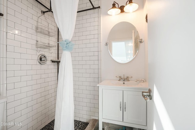 bathroom with vanity and a shower with curtain