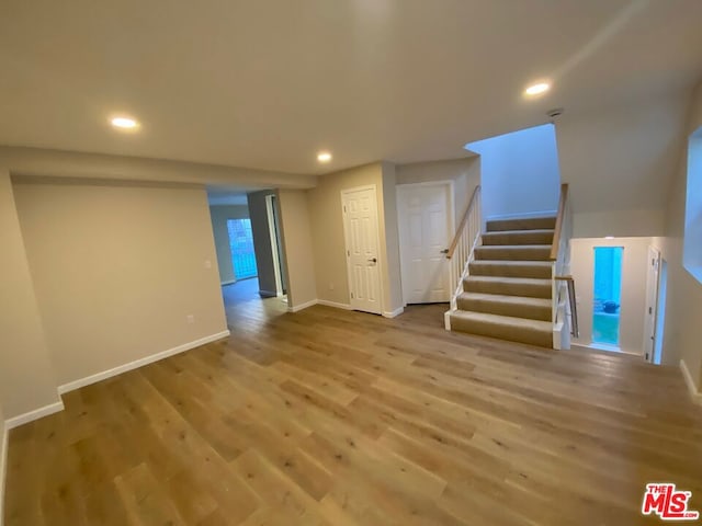 basement with light wood-type flooring