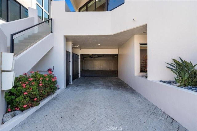 734 Esplanade Unit A, Redondo Beach, CA 90277 - view of side of home with stucco siding and stairs