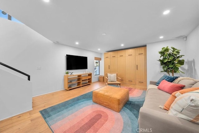 living room with light hardwood / wood-style flooring