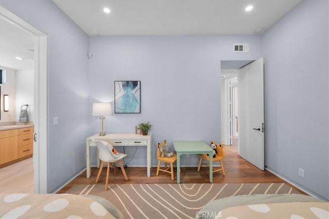 bedroom featuring light hardwood / wood-style floors