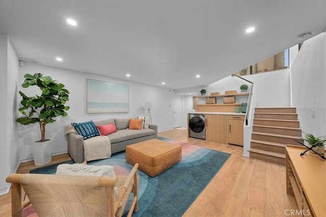 734 Esplanade Unit A, Redondo Beach, CA 90277 - living room with light wood-style flooring, stairway, washer / clothes dryer, recessed lighting, and bar