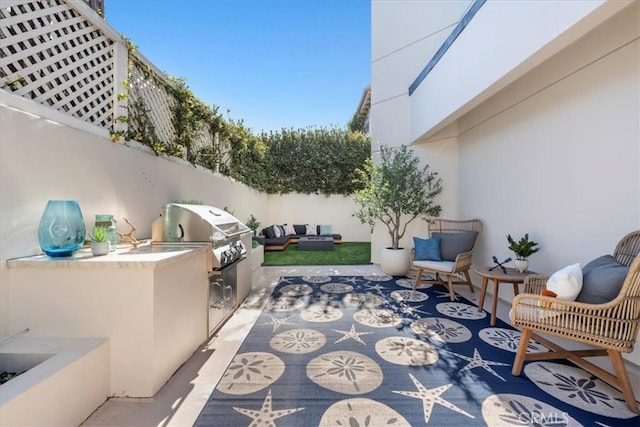 view of patio featuring a grill and area for grilling