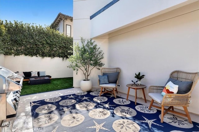 view of patio / terrace with a grill