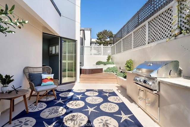 734 Esplanade Unit A, Redondo Beach, CA 90277 - view of patio / terrace featuring grilling area, exterior kitchen, and fence