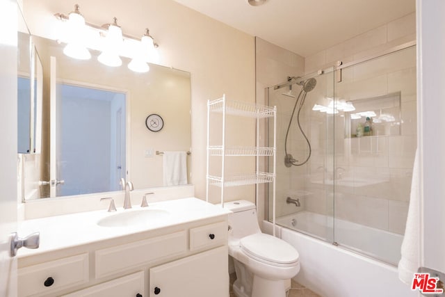 full bathroom with vanity, toilet, and enclosed tub / shower combo