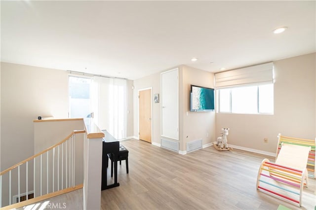 living area featuring light hardwood / wood-style flooring