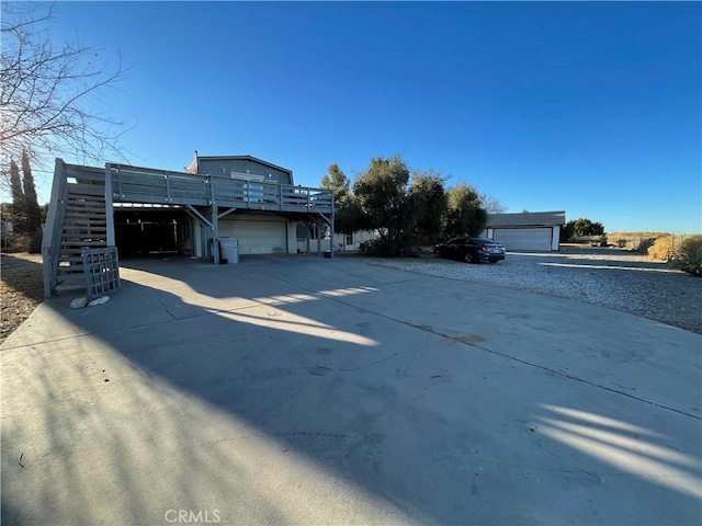 7928 Oakwood Ave, Hesperia, CA 92345 - exterior space with a deck and a garage