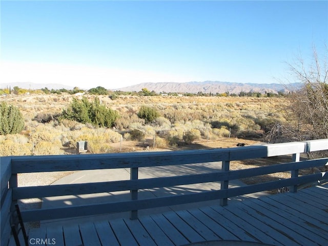 7928 Oakwood Ave, Hesperia, CA 92345 - wooden terrace with a mountain view
