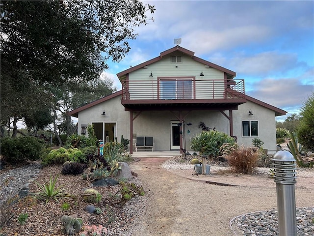 rear view of property with a patio