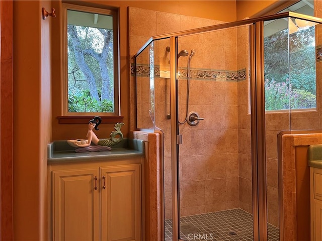 bathroom featuring an enclosed shower