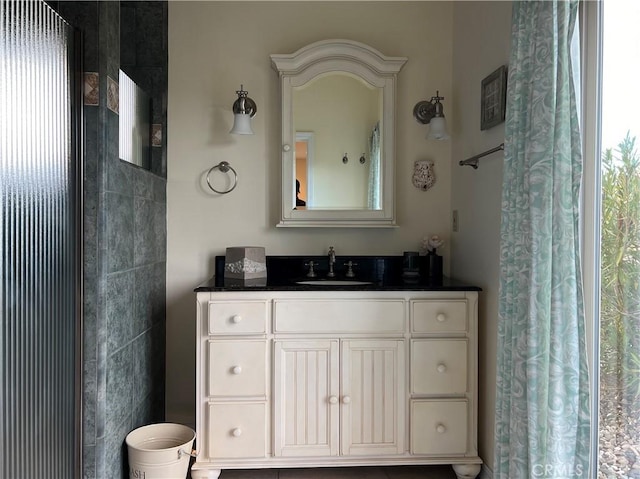 bathroom featuring vanity and walk in shower