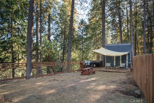 view of yard with a deck