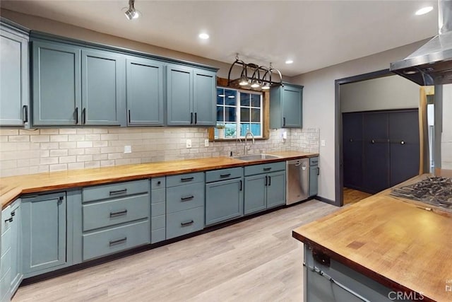 kitchen with wooden counters, island exhaust hood, light wood-type flooring, sink, and dishwasher