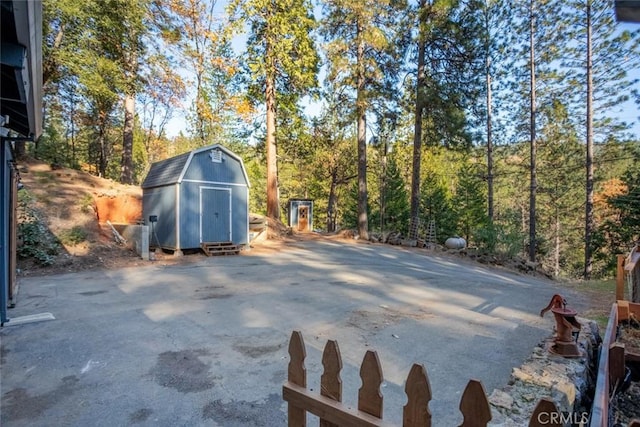 view of patio / terrace featuring a shed