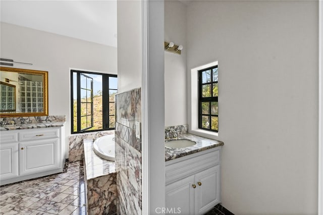 bathroom featuring a bathtub and vanity