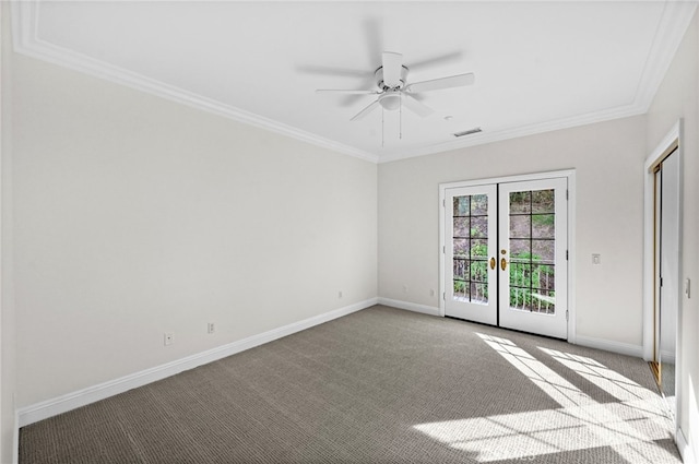 unfurnished room with ceiling fan, ornamental molding, light carpet, and french doors