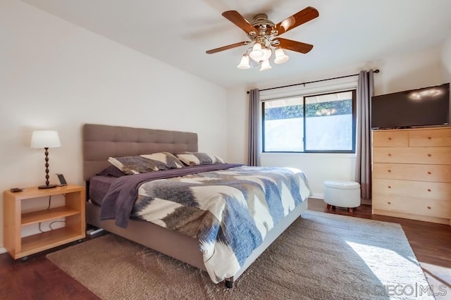 bedroom featuring ceiling fan and dark hardwood / wood-style flooring