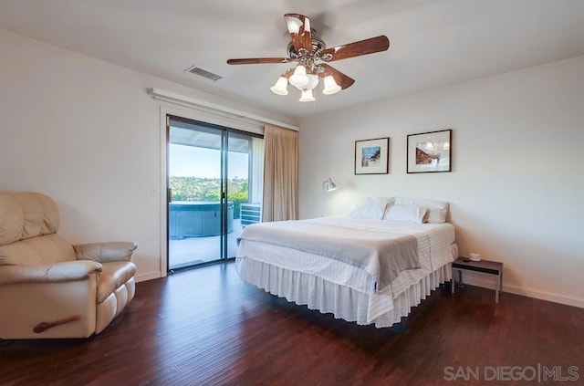 bedroom featuring access to exterior, ceiling fan, and dark hardwood / wood-style floors