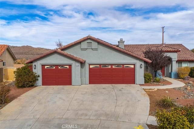 single story home featuring a garage